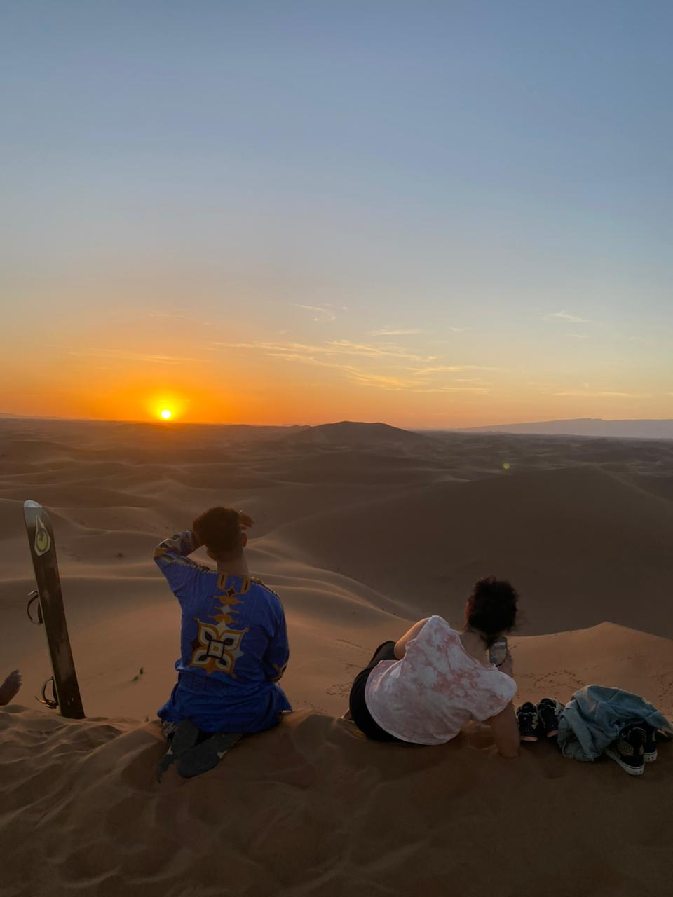 Sunset over Sahara dunes Morocco
